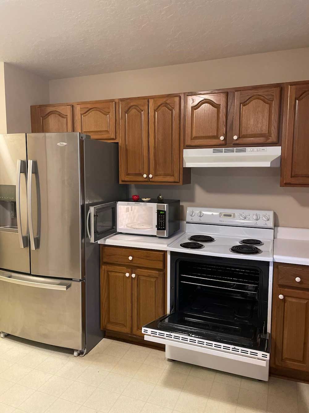 A freshly clean kitchen oven and microwave